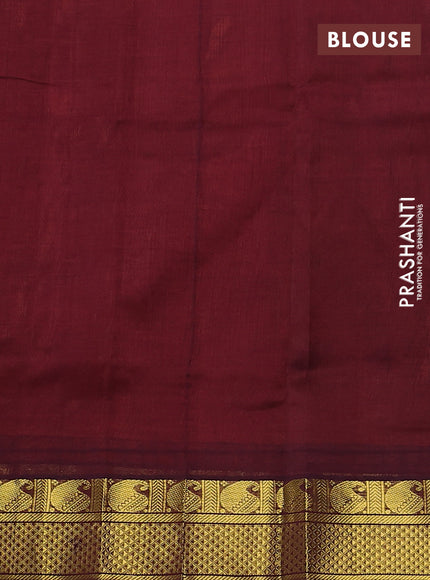 Silk cotton saree orange and deep maroon with plain body and zari woven border