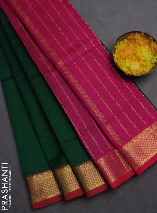 Silk cotton saree green and pink with plain body and zari woven border