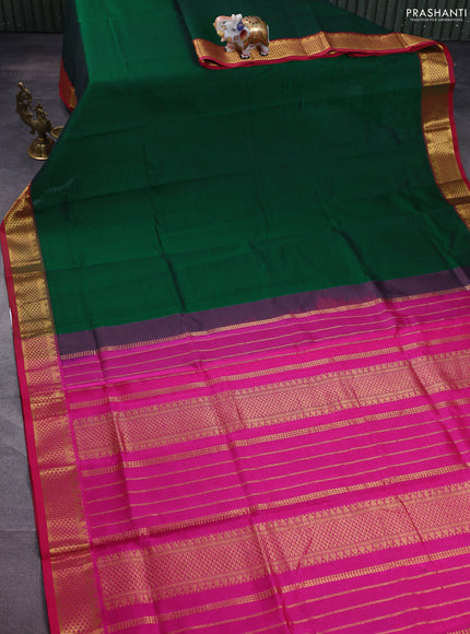 Silk cotton saree green and pink with plain body and zari woven border
