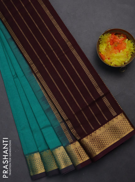 Silk cotton saree teal blue and deep maroon with plain body and zari woven border