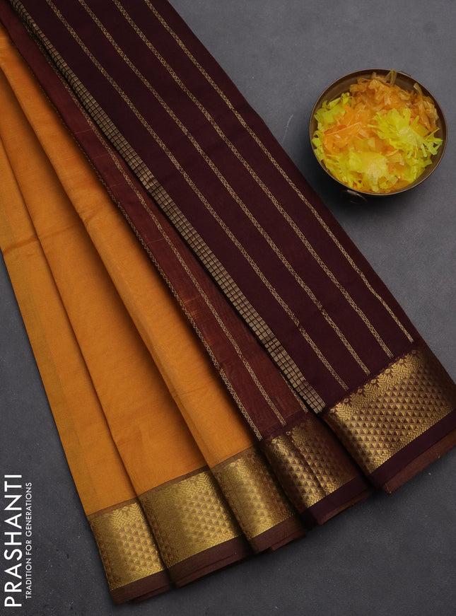 Silk cotton saree mustard yellow and coffee brown with plain body and zari woven border