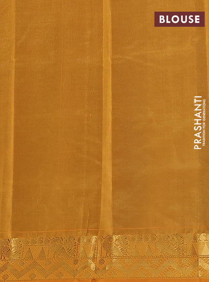 Silk cotton saree green and mustard yellow with plain body and zari woven border