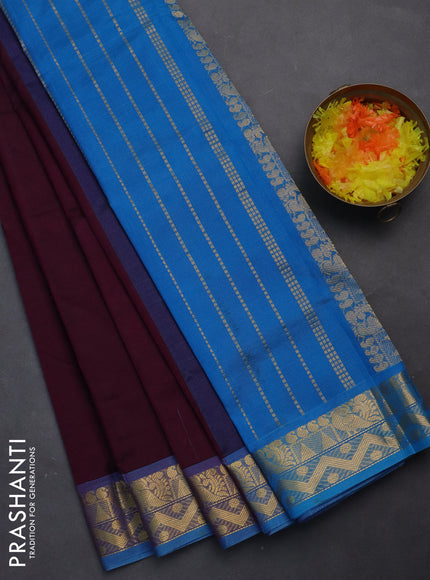 Silk cotton saree wine shade and cs blue with plain body and zari woven border