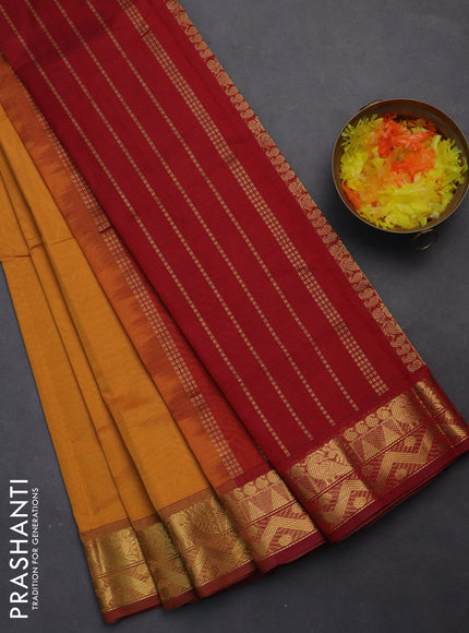 Silk cotton saree mustard yellow and maroon with plain body and zari woven border