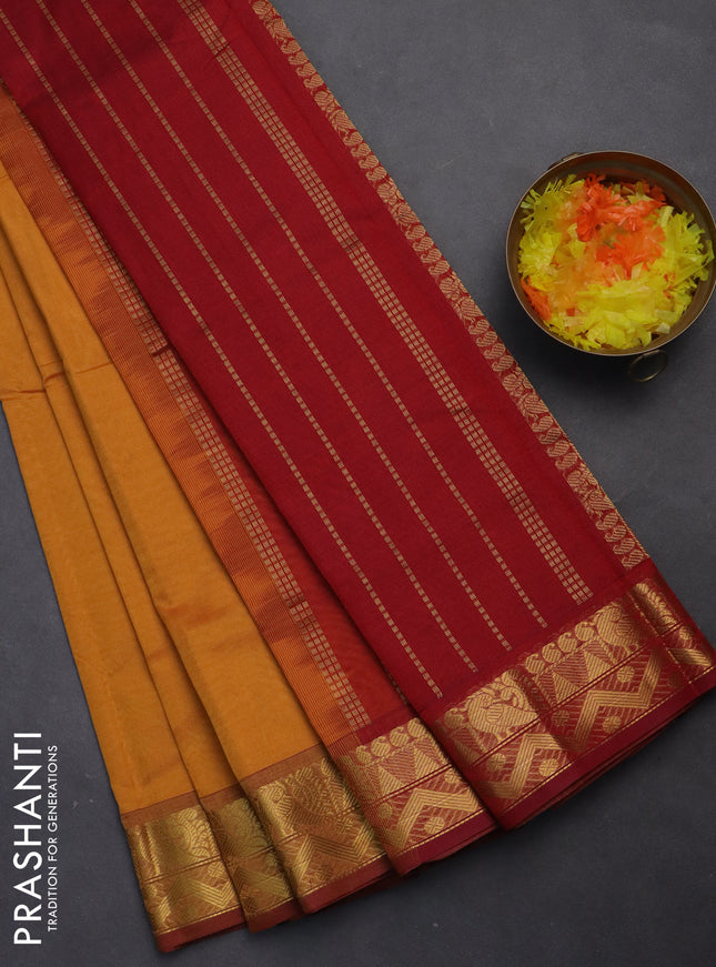 Silk cotton saree mustard yellow and maroon with plain body and zari woven border