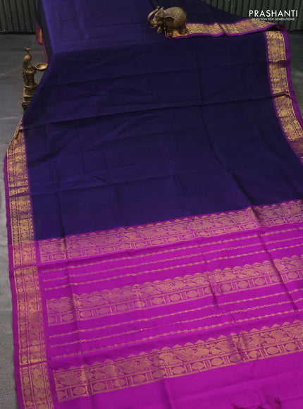 Silk cotton saree navy blue and purple with plain body and zari woven border