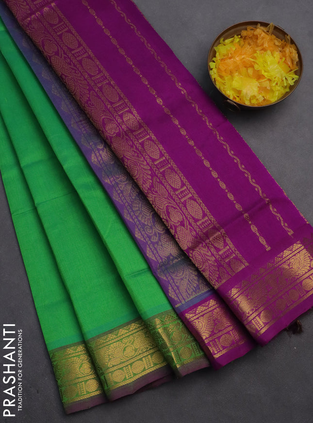 Silk cotton saree light green and purple with plain body and zari woven border