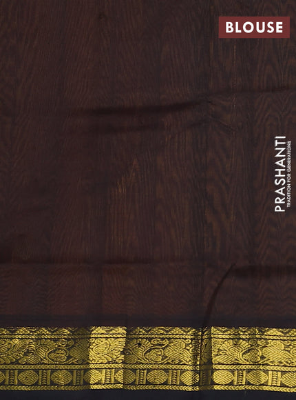 Silk cotton saree orange and black with plain body and zari woven border