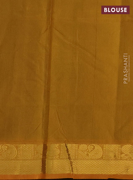 Silk cotton saree green and mustard yellow with plain body and zari woven border