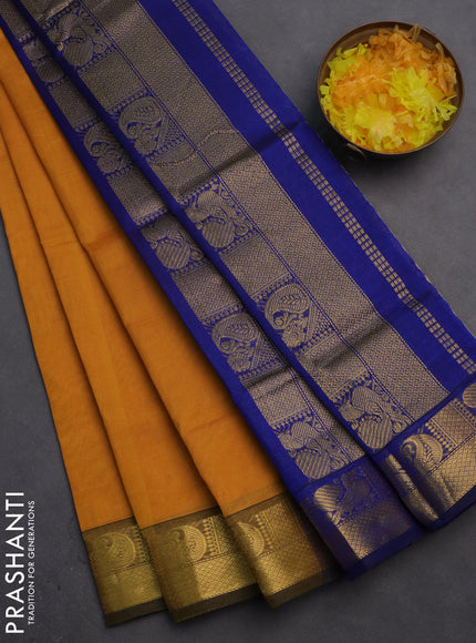 Silk cotton saree mustard yellow and blue with plain body and zari woven border