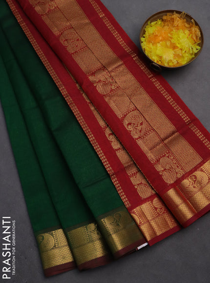 Silk cotton saree green and maroon with plain body and zari woven border