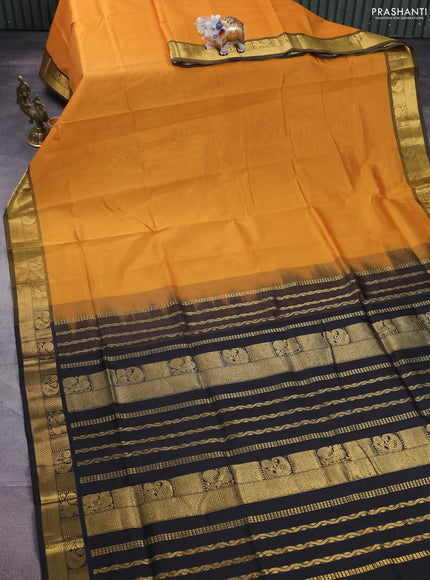 Silk cotton saree mustard yellow and black with plain body and zari woven border