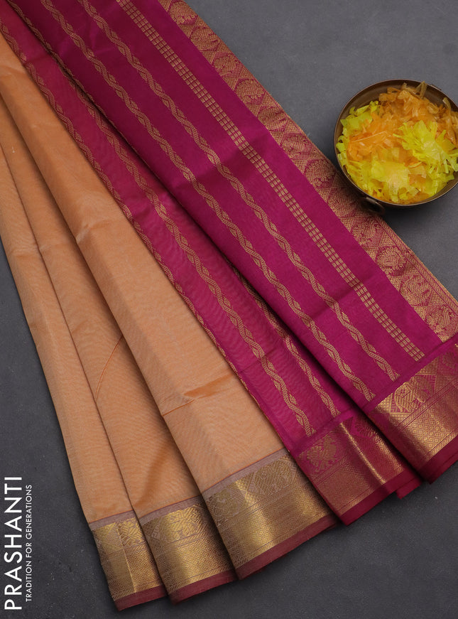 Silk cotton saree pale orange and pink with plain body and zari woven border