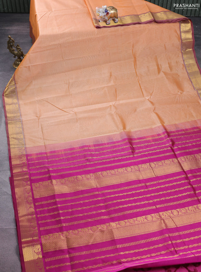 Silk cotton saree pale orange and pink with plain body and zari woven border