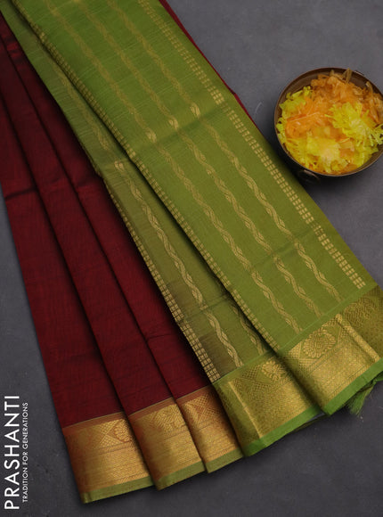 Silk cotton saree maroon and light green with plain body and zari woven border