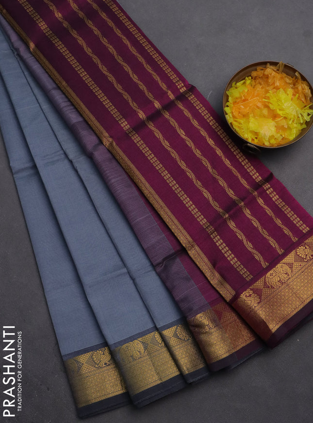 Silk cotton saree grey and wine shade with plain body and zari woven border