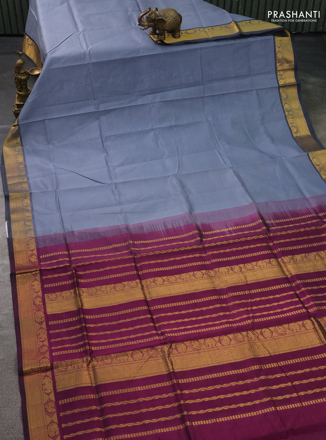 Silk cotton saree grey and wine shade with plain body and zari woven border