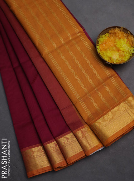 Silk cotton saree dark magenta pink and mustard yellow with plain body and zari woven border