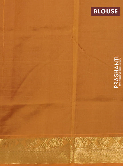 Silk cotton saree dark magenta pink and mustard yellow with plain body and zari woven border