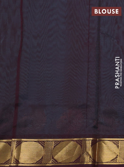 Silk cotton saree teal blue and brown with plain body and zari woven border