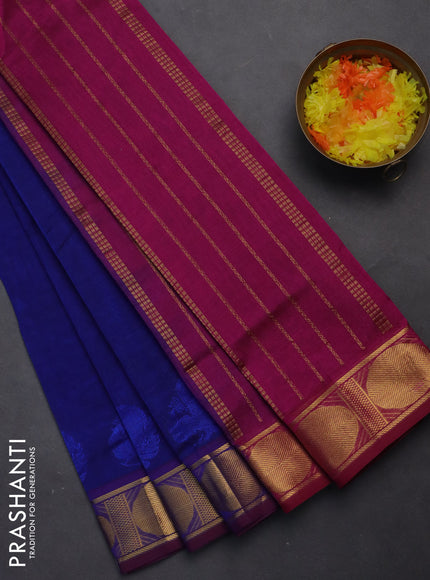 Silk cotton saree blue and magenta pink with plain body and zari woven border