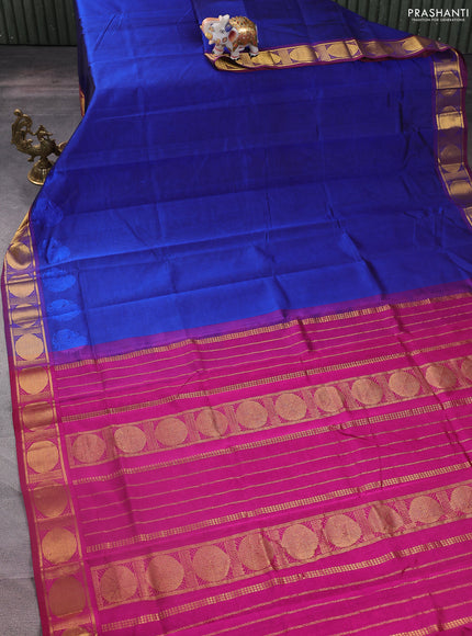 Silk cotton saree blue and magenta pink with plain body and zari woven border