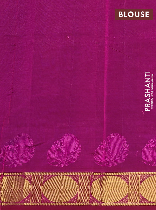 Silk cotton saree blue and magenta pink with plain body and zari woven border