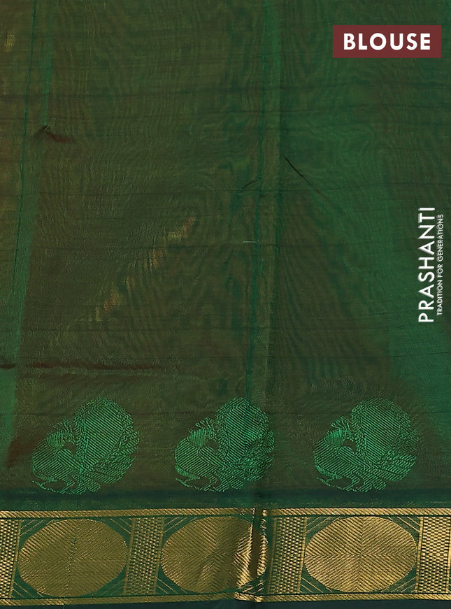 Silk cotton saree orange and green with plain body and zari woven border