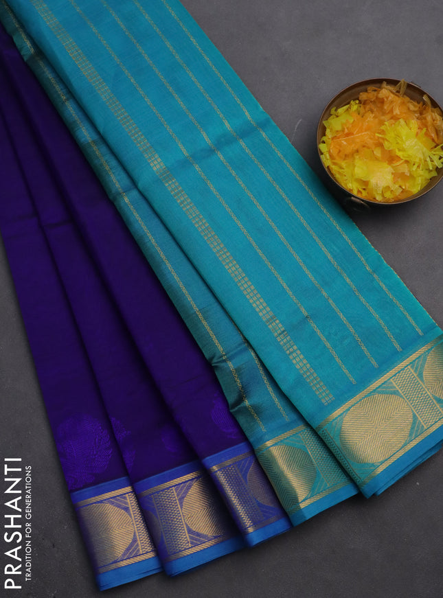 Silk cotton saree navy blue and teal blue with plain body and zari woven border