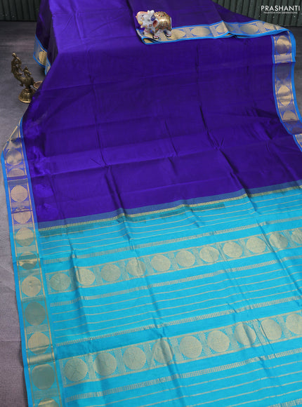 Silk cotton saree navy blue and teal blue with plain body and zari woven border