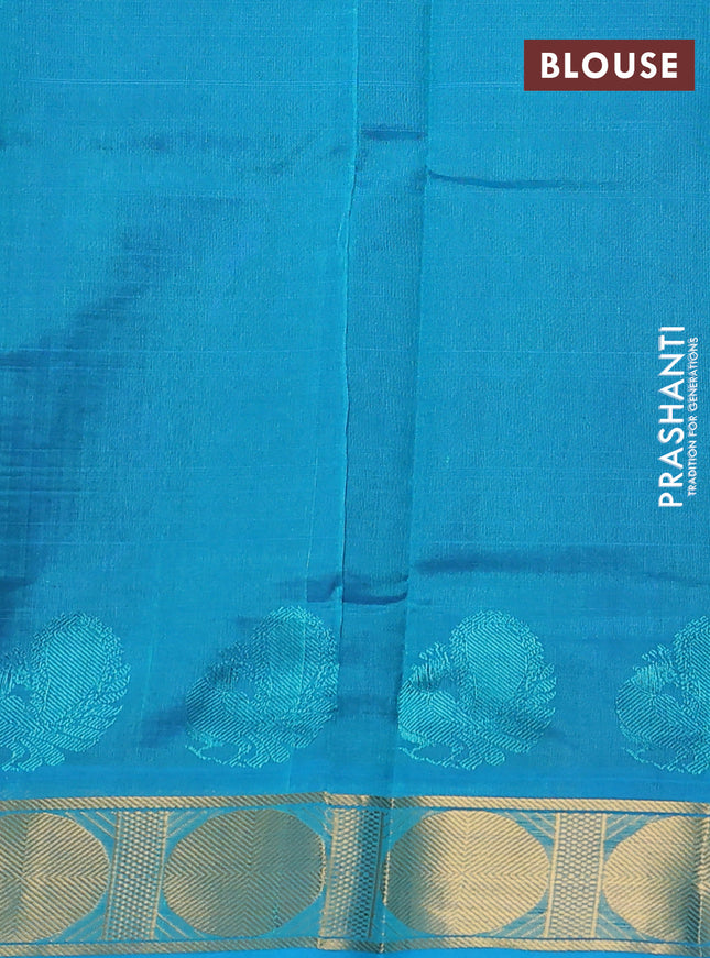Silk cotton saree navy blue and teal blue with plain body and zari woven border