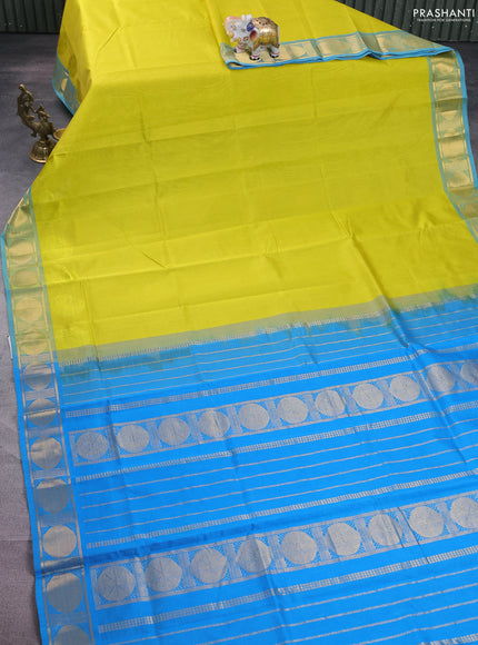 Silk cotton saree lime yellow and cs blue with plain body and zari woven border