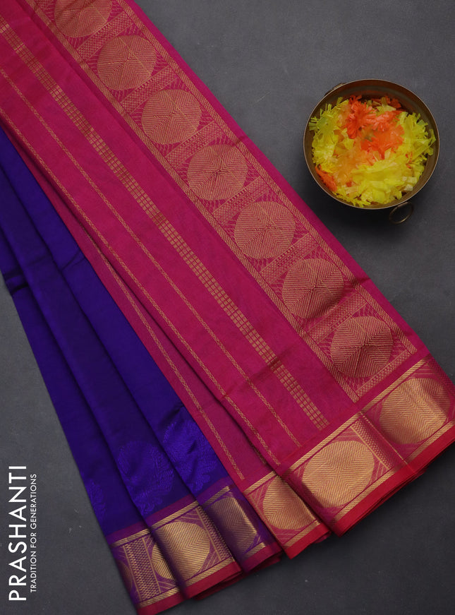 Silk cotton saree blue and pink with plain body and zari woven border