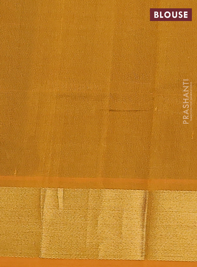 Silk cotton saree green and mustard yellow with plain body and zari woven border