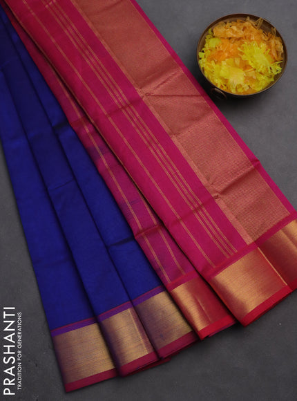 Silk cotton saree dark blue and magenta pink with plain body and zari woven border