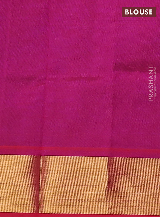 Silk cotton saree dark blue and magenta pink with plain body and zari woven border