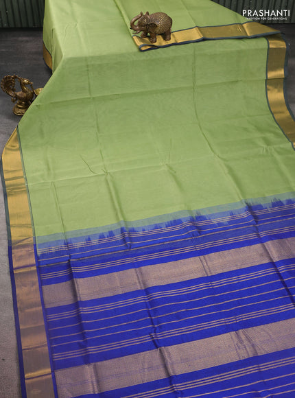 Silk cotton saree pastel green and blue with plain body and zari woven border