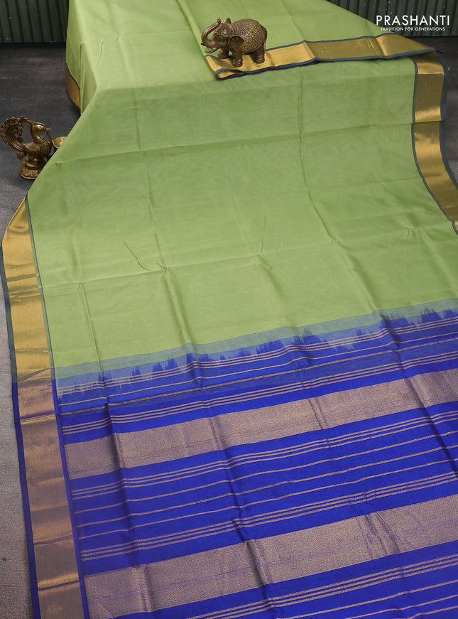 Silk cotton saree pastel green and blue with plain body and zari woven border