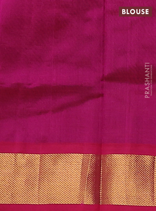 Silk cotton saree green and magenta pink with plain body and zari woven border