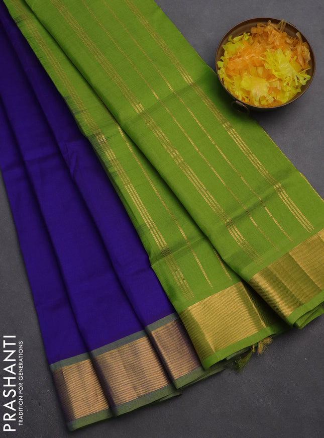 Silk cotton saree blue and light green with plain body and zari woven border
