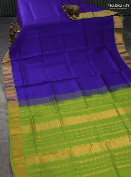 Silk cotton saree blue and light green with plain body and zari woven border