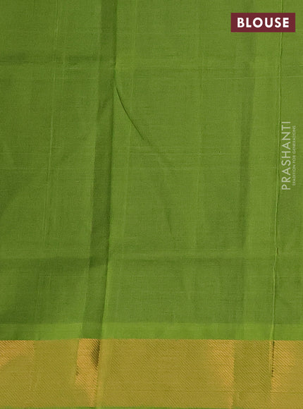 Silk cotton saree blue and light green with plain body and zari woven border