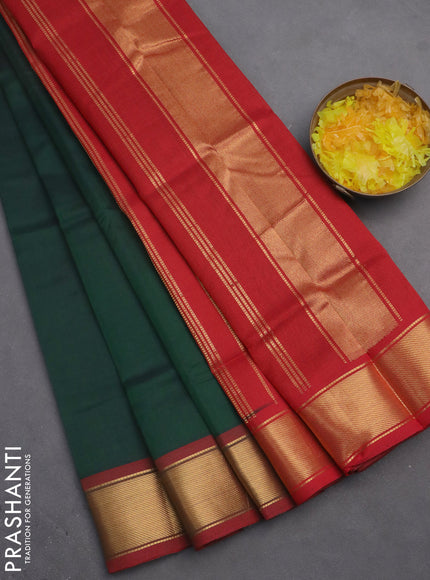 Silk cotton saree green and red with plain body and zari woven border