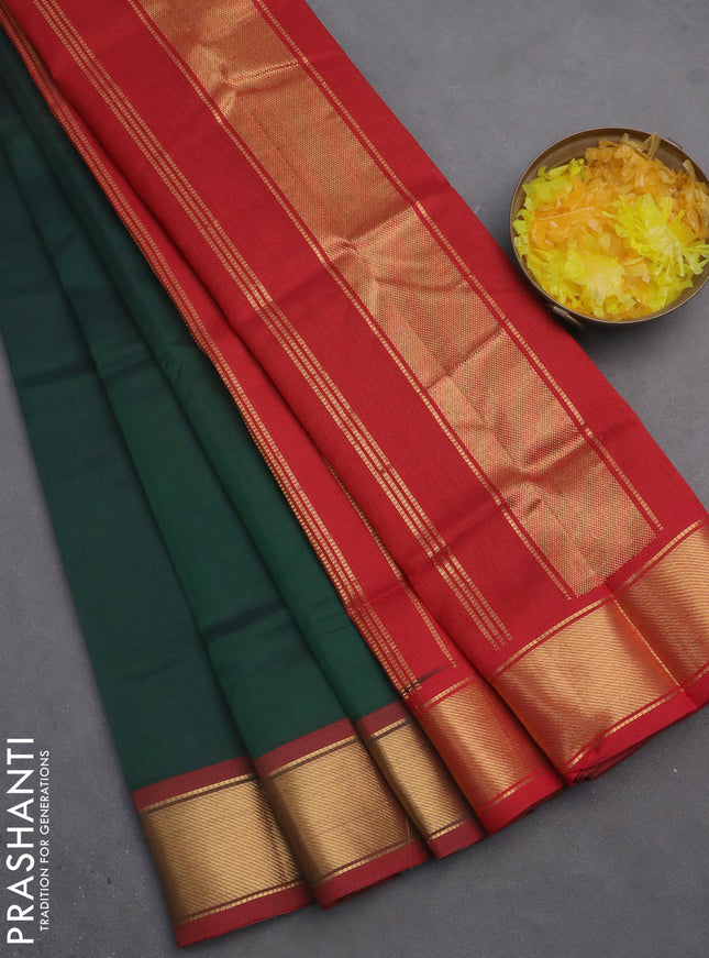 Silk cotton saree green and red with plain body and zari woven border