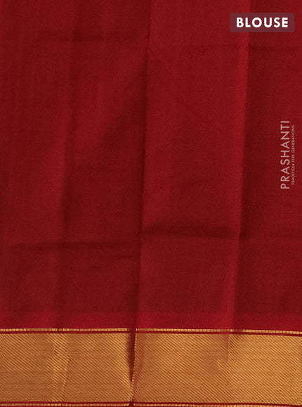 Silk cotton saree green and red with plain body and zari woven border