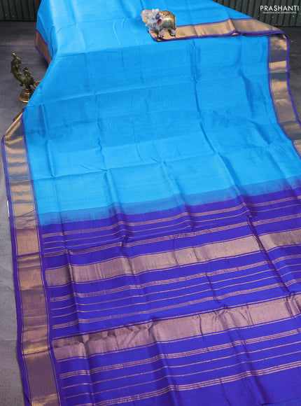 Silk cotton saree light blue and blue with plain body and zari woven border