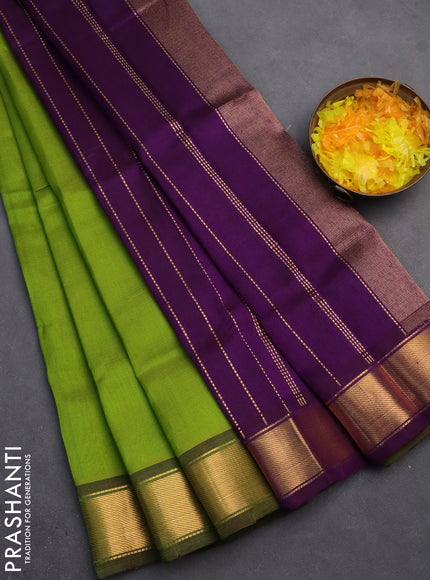 Silk cotton saree lime green and purple with plain body and zari woven border
