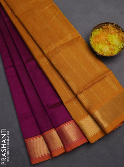 Silk cotton saree magenta pink and mustard yellow with plain body and zari woven border