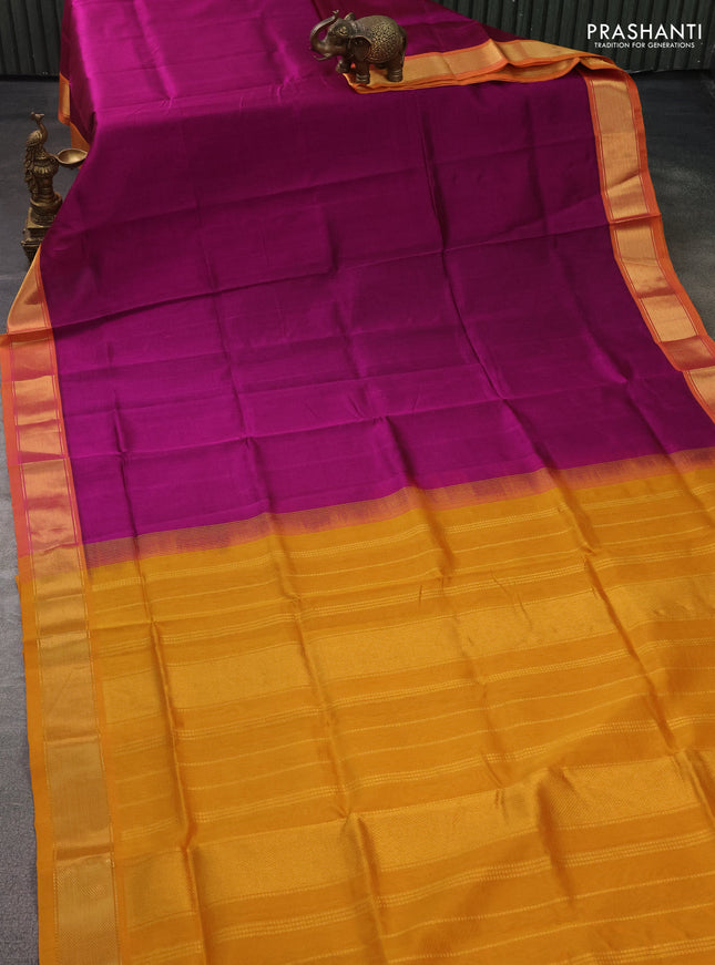 Silk cotton saree magenta pink and mustard yellow with plain body and zari woven border