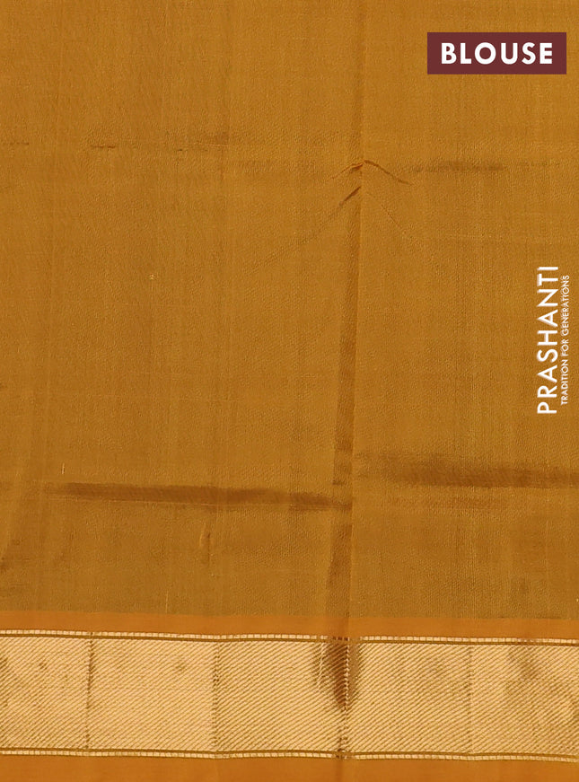 Silk cotton saree dual shade of green and mustard yellow with plain body and zari woven border